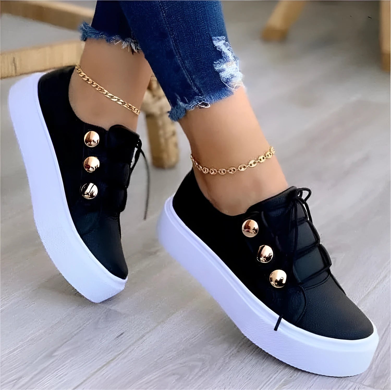 Women's white lace-up flats sneakers with metal rivet detailing and round toe design