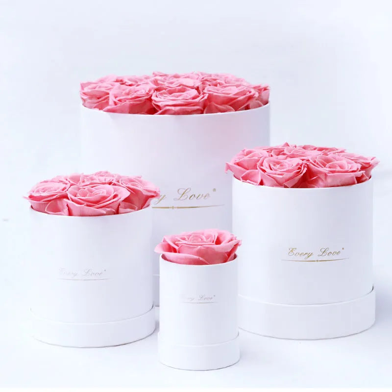 Handmade everlasting rose in hug bucket with preserved flower material, available in white red pink black blue colours