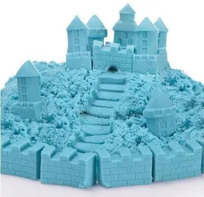 Kinetic space sand in multiple colours including blue, green, orange, pink, purple, red, rose, and sand colour in plastic bag packaging