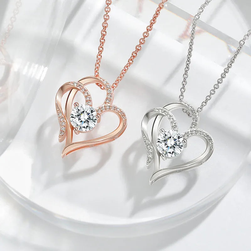 Women's silver heart necklace with choice of rose gold, white gold, or yellow gold pendant.