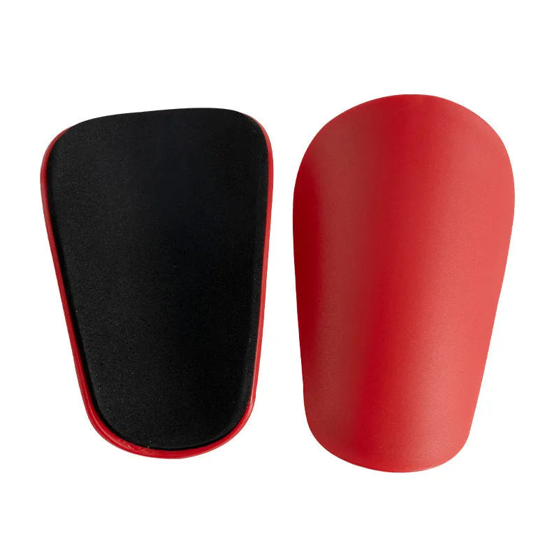 PU mini shin guards for football and sports, shown in black, white, red, and blue colours.