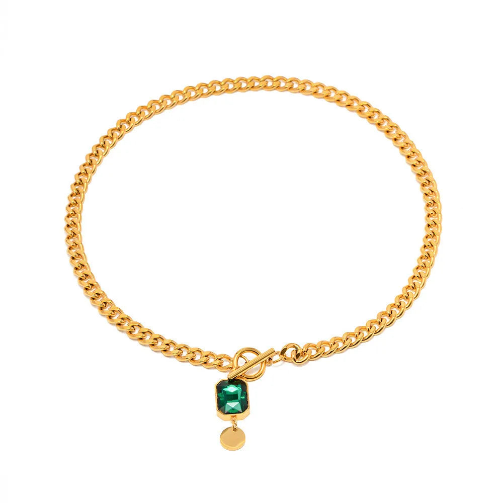Gold electroplated titanium steel pendant necklace with geometric round design and Cuban link chain