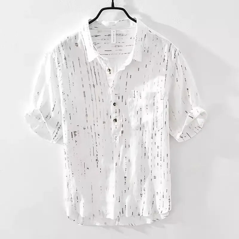 Man wearing a loose-fit black short-sleeved polo shirt, cardigan style, for casual summer wear.