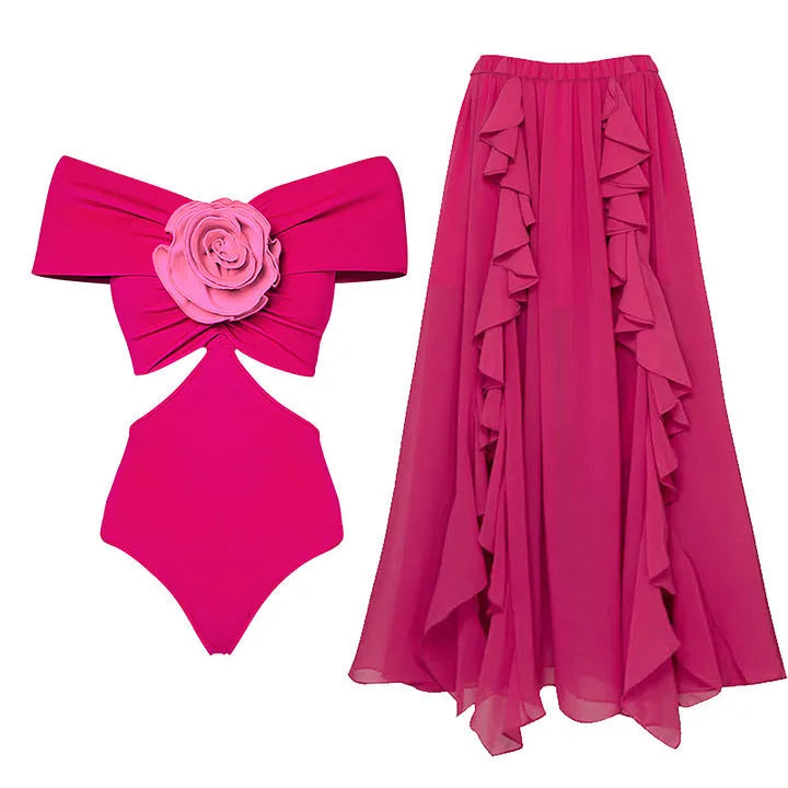 Women's floral patterned hollow out one-piece swimsuit with a separate white skirt laid flat.