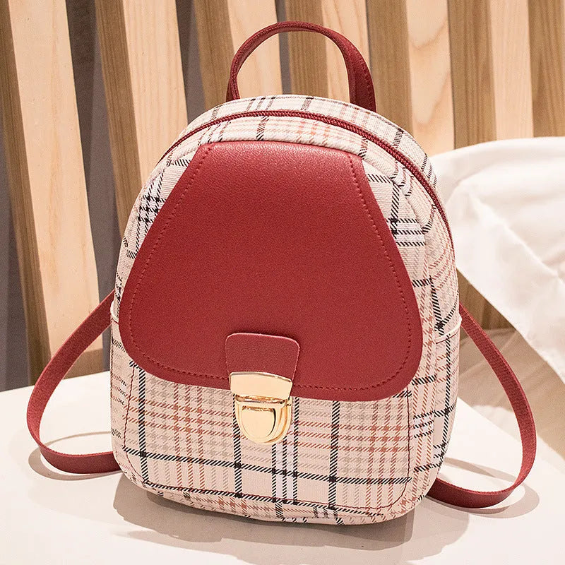 Diagonal one shoulder phone bag in PU leather available in five colours.