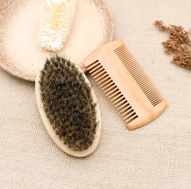 Men's beard care set with double-sided wooden comb and oval brush on light background