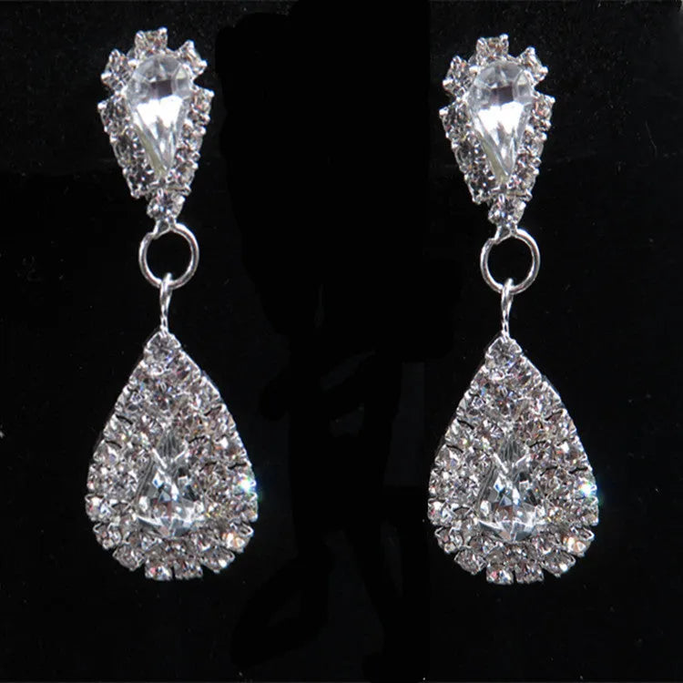 Bride wedding accessories earrings set with drop necklace on display