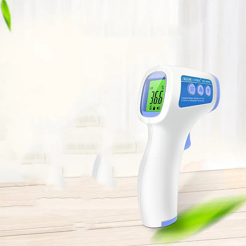 White RAK-FI03 infrared forehead thermometer held near a child's forehead showing non-contact measurement