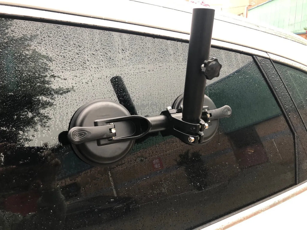 Black off-road car flagpole sucker base with round glass suction cup and rubber disc.