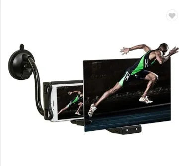 Black 12-inch mobile phone screen amplifier with adjustable bracket on a table.