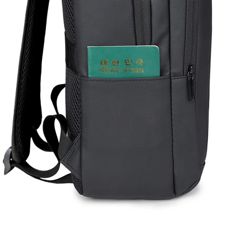 Waterproof laptop backpack in black with USB port and air pillow belt, 20-35L capacity