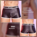 Men's shiny silky nylon boxer shorts in black, white, and sapphire blue colours showing breathable construction