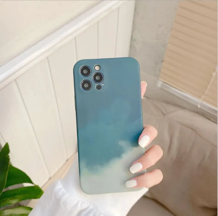 Soft silicone iPhone case with blue and purple oil painting gradient and white geometric abstract pattern.