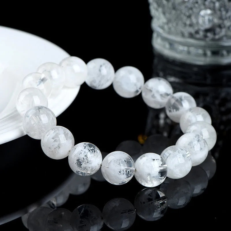 Women's natural blizzard crystal bracelet with geometric beads featuring Ruyi and Xiangyun design.