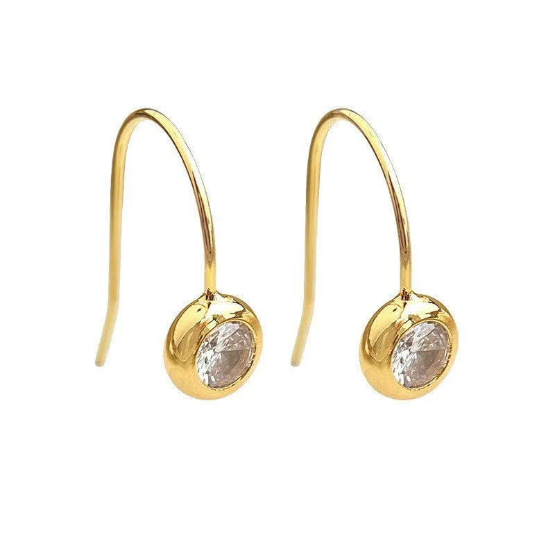 Simple round zircon earrings on display, geometric shape, light luxury style for women