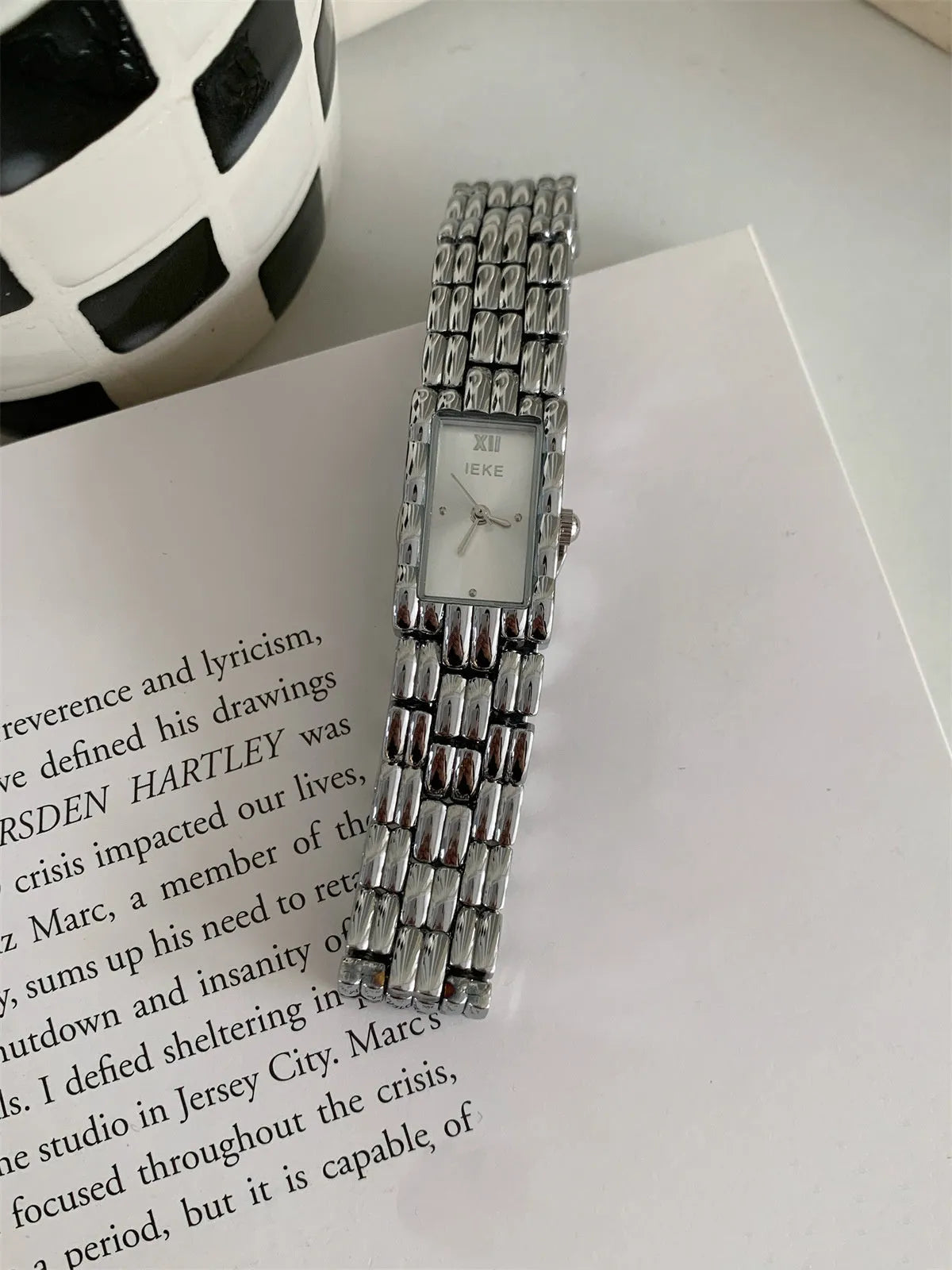 Women's stainless steel bracelet watch with 15mm dial and butterfly buckle