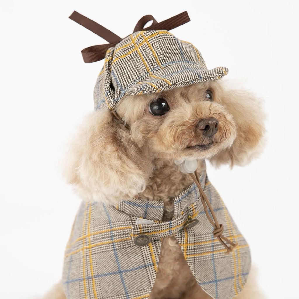 Camel coloured cotton pet cloak with adjustable hat showing six size options for dogs