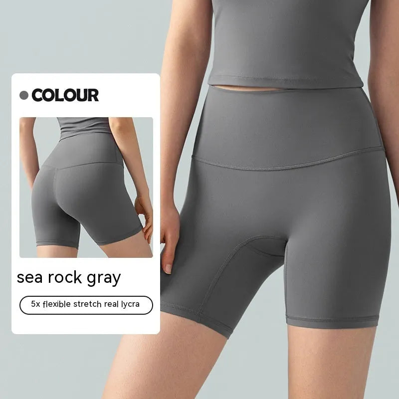 Women's high waist leaf green Lycra yoga shorts for fitness and cycling.