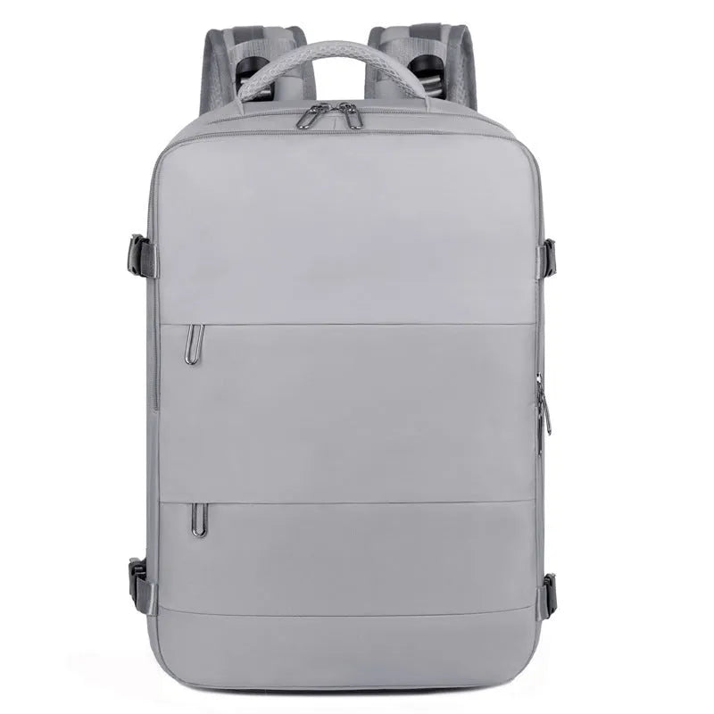 Large purple travel backpack for women with multiple compartments on a grey background.