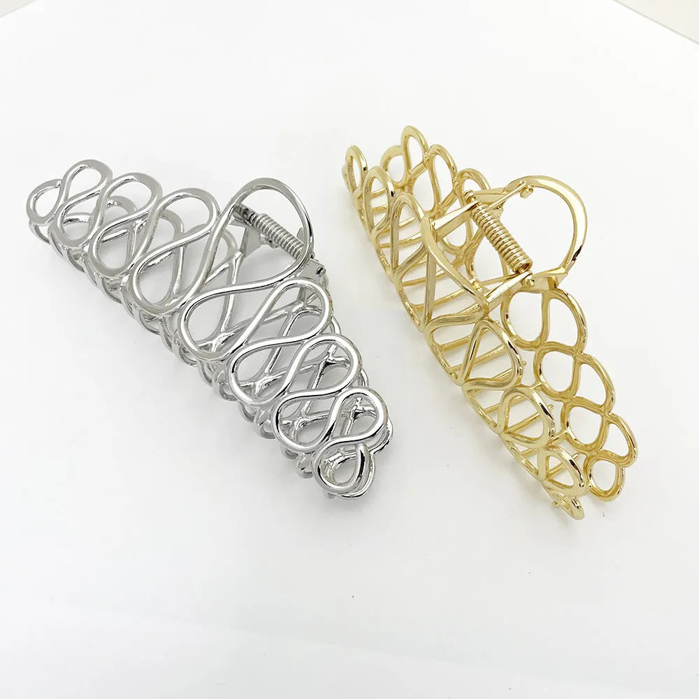 Large minimalist hair clip with tassel detail in gold or silver electroplated alloy