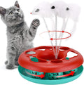 Red cat toy roller track with exercise balls, catnip spring, and detachable mouse teaser on floor
