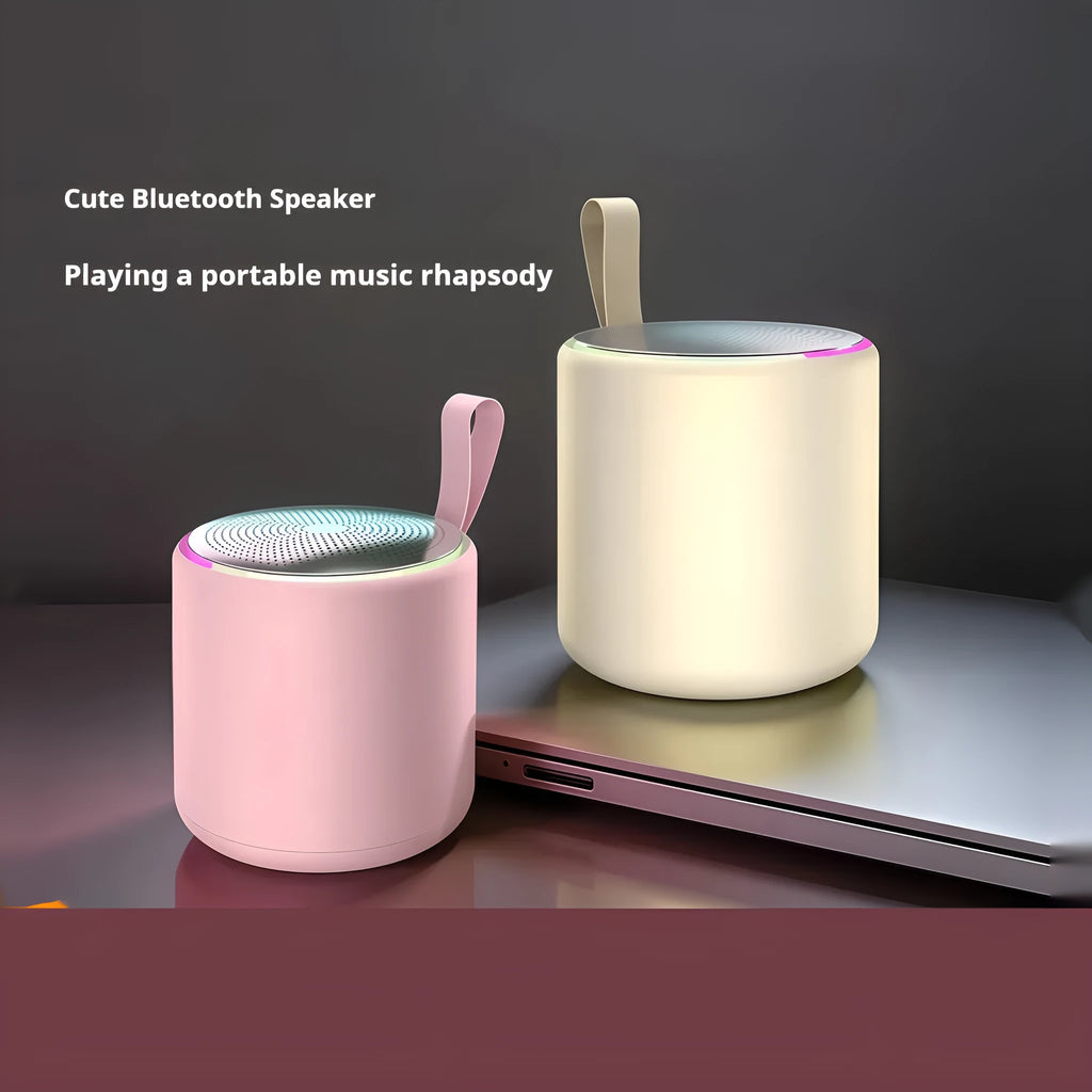 Bluetooth mini portable speaker in black with charging cable