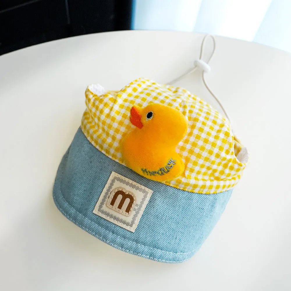 Three-piece pet clothing set with cute hat, dog harness, and wire rope leash in spring summer design