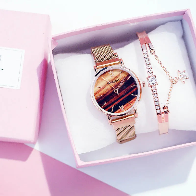 Women's retro marble watch with 32mm round dial, alloy strap, and titanium case back on white background