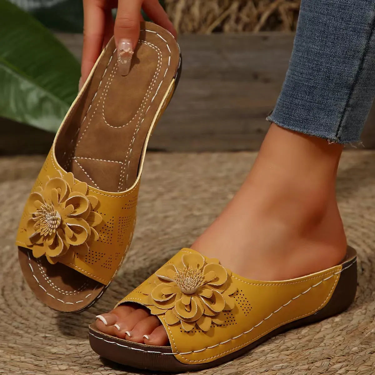 Women's dark brown peep-toe slippers with a thick rubber sole and fish mouth design on a white background.