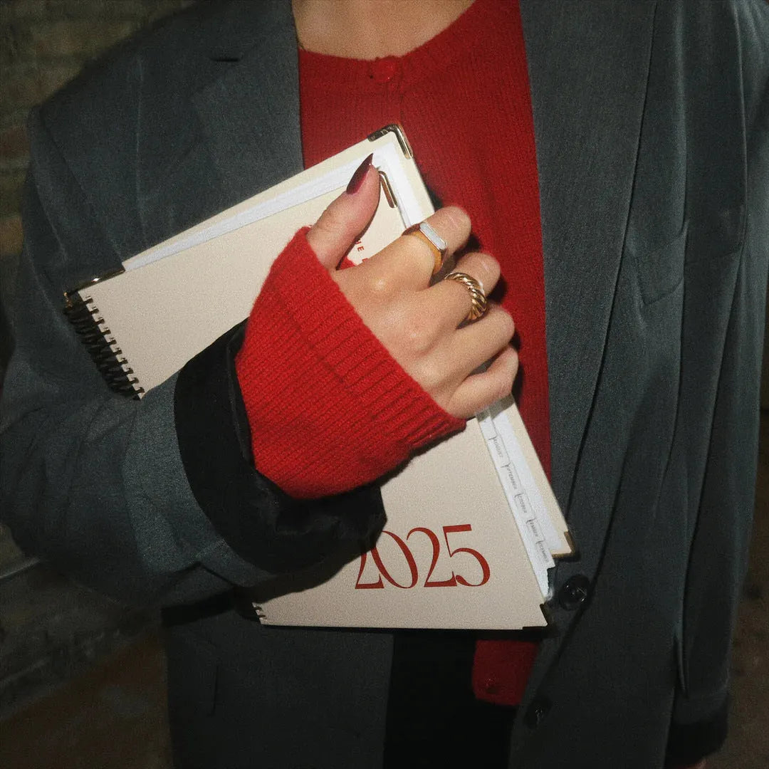 Cherry red wire-bound coil notebook for daily schedules and planning
