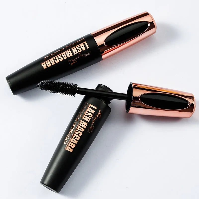 Black waterproof mascara tube with thick curling brush applicator