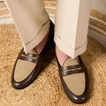 Brown suede leather loafers with high-gloss finish and stitched construction