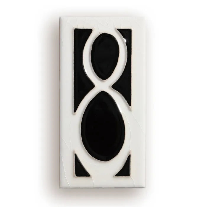 Handmade retro-style ceramic doorplate with a white enamel background and a raised black number 5, shown at 76mm by 152mm.