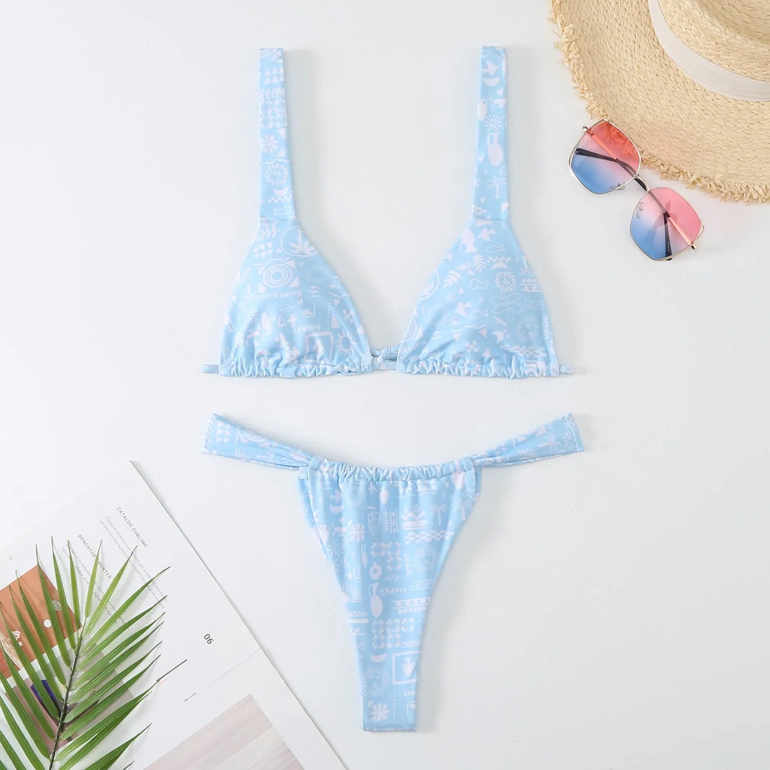 Women's floral print bikini swimsuit in blue colour with bra and panties set