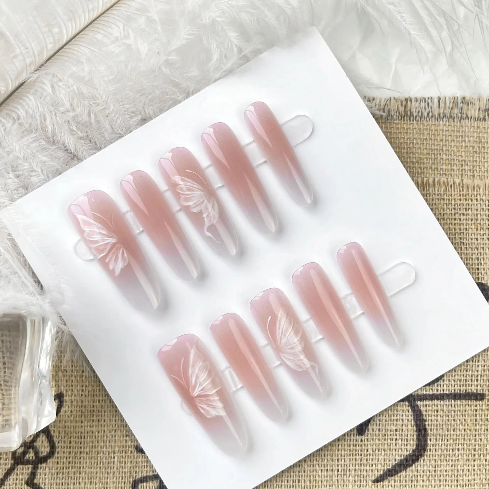 Chinese style butterfly oval almond press-on nails 40pcs matte and glossy finish options on display