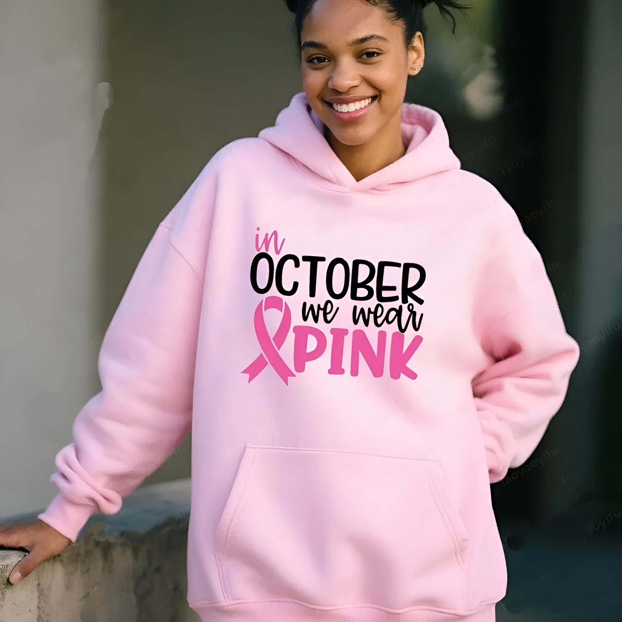 Survivor themed pullover hoodie with retro hot stamp art pattern and side seam pockets.