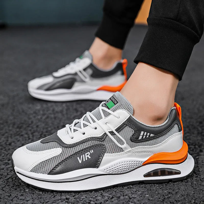 Men's grey breathable mesh casual running shoes with a lightweight EVA sole on a white background.