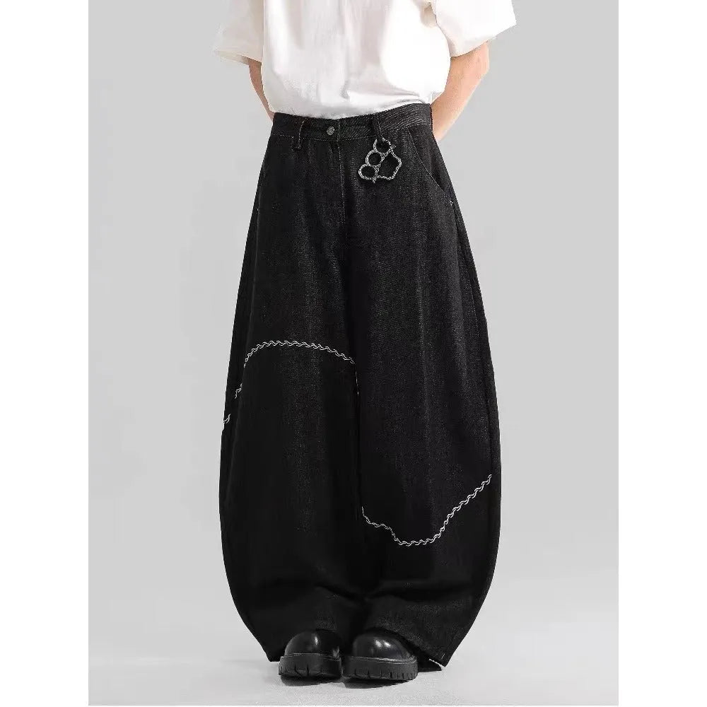 Black straight-leg polyester denim trousers on a hanger, showing mid-waist fit and zip fly.