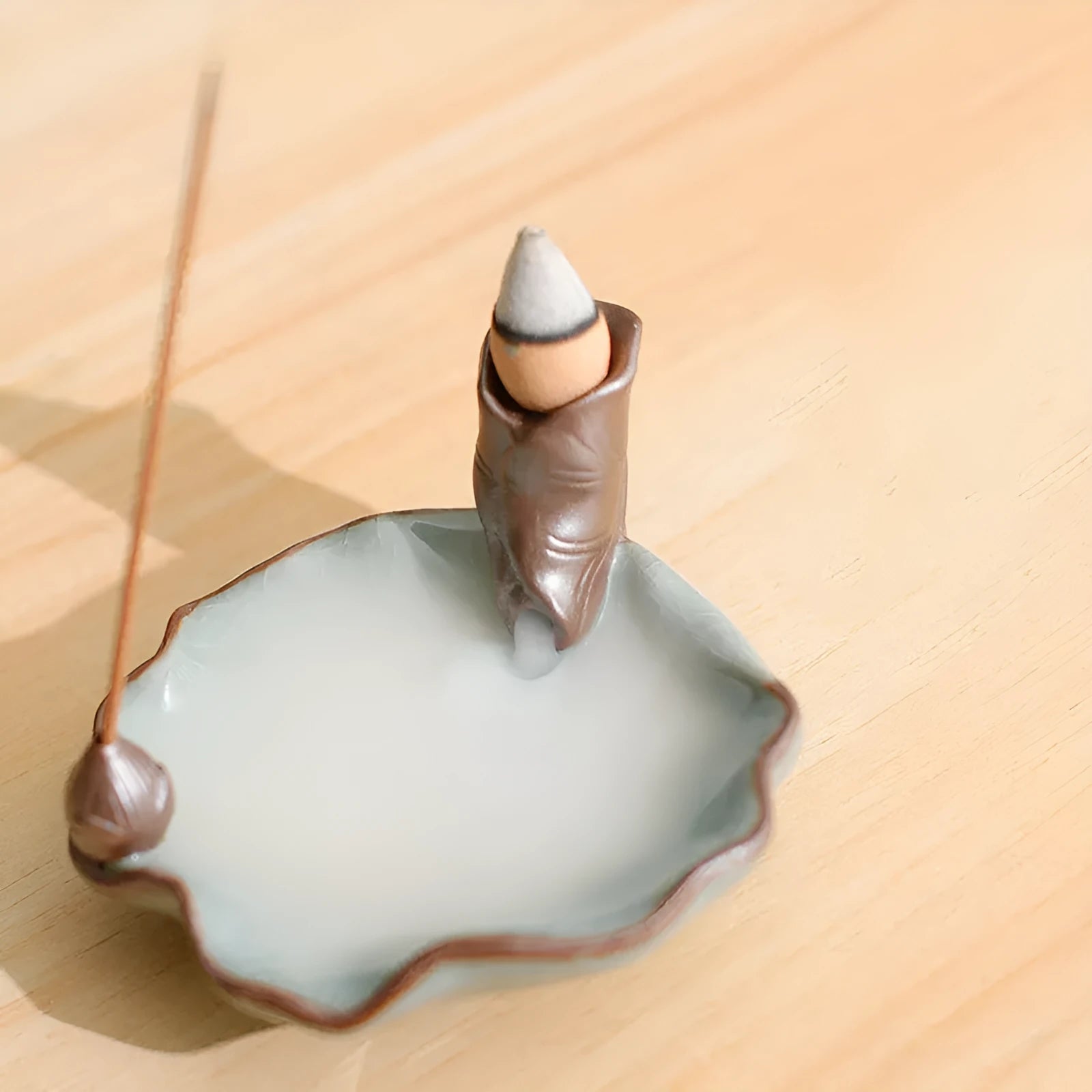 Square ceramic reverse flow incense burner with lotus and plum blossom decorative motifs
