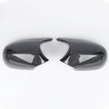 Pair of black ABS plastic rearview mirror housings for BMW 3 Series E90 on a white background.