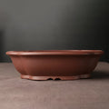 Handmade purple clay bonsai basin with Chinese classical design measuring 25x20cm