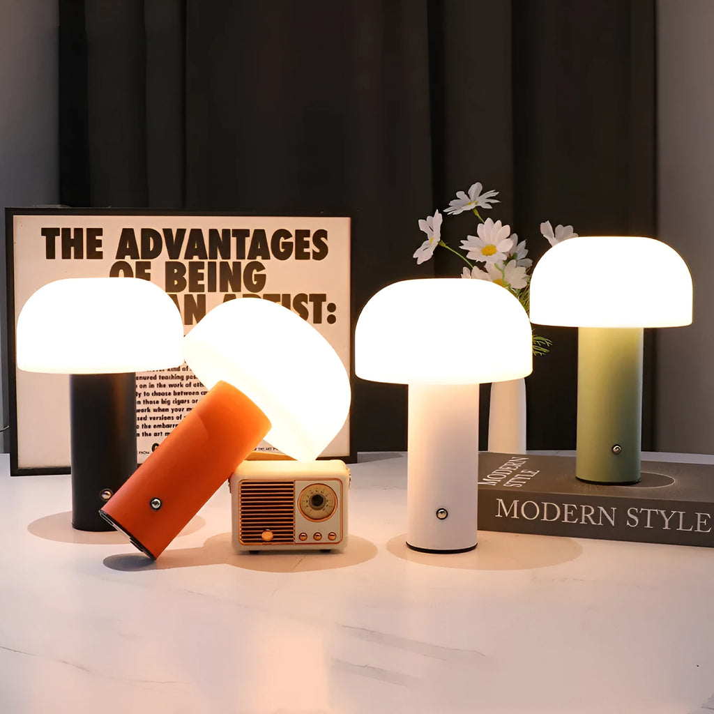 USB table lamp in black, green, orange, or white colours on a desk surface