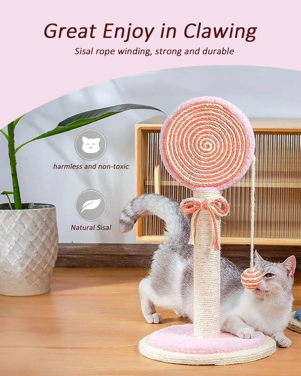 Cat scratching post with natural sisal rope surface and hanging ball toy on heavy-duty stable base