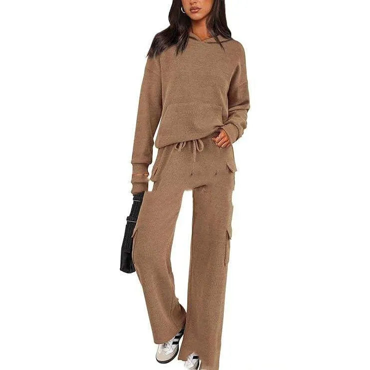 Women's long sleeve leisure sport suit top and trousers set in polyester fabric.