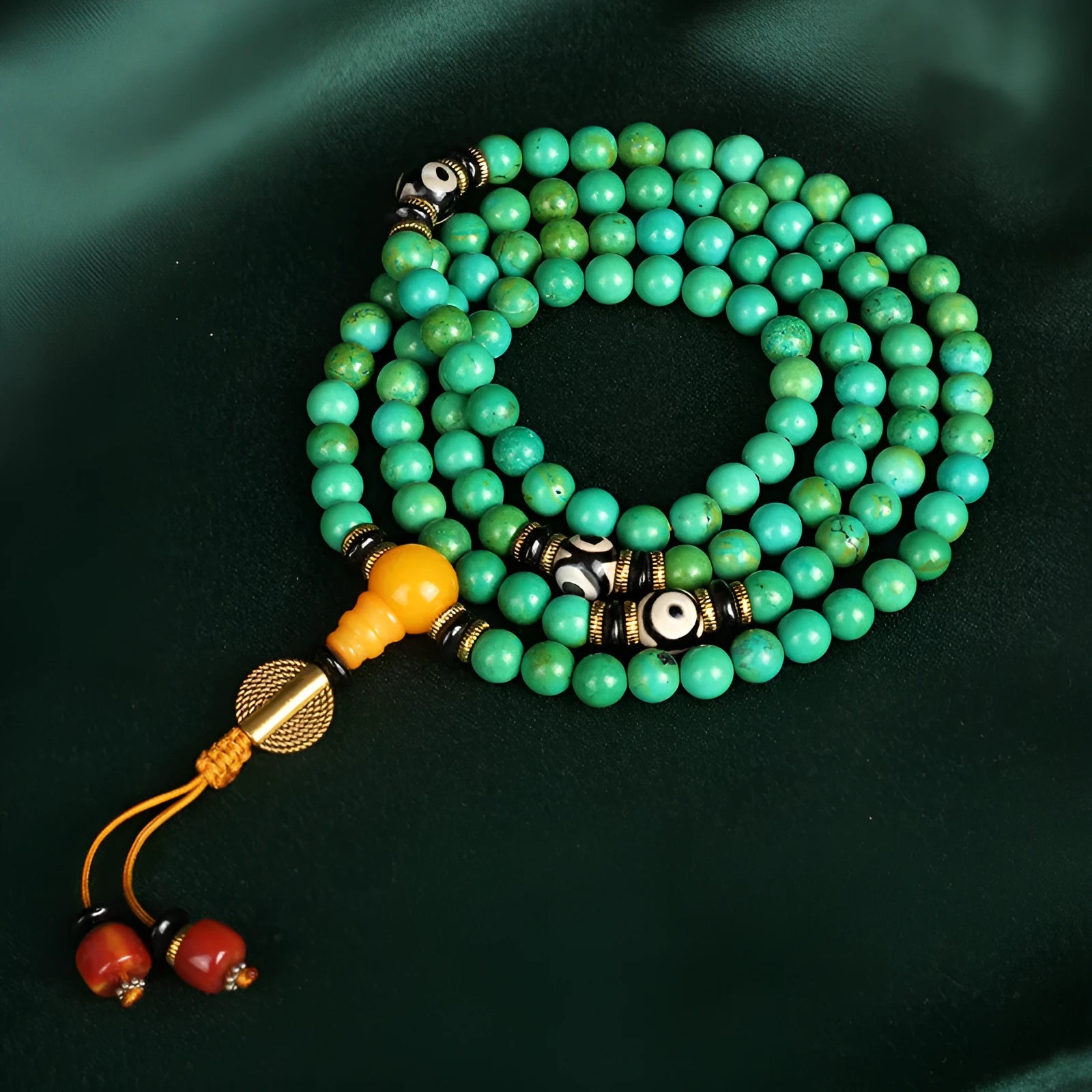 Natural turquoise gemstone bracelet with 108 round 8mm polished beads on a string.