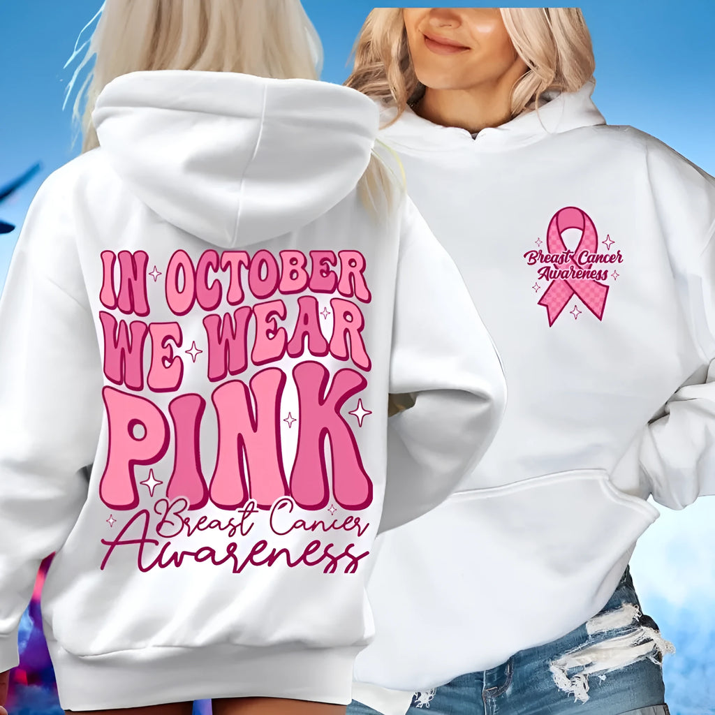Pink breast cancer awareness pullover hoodie with retro art print and side seam pockets.