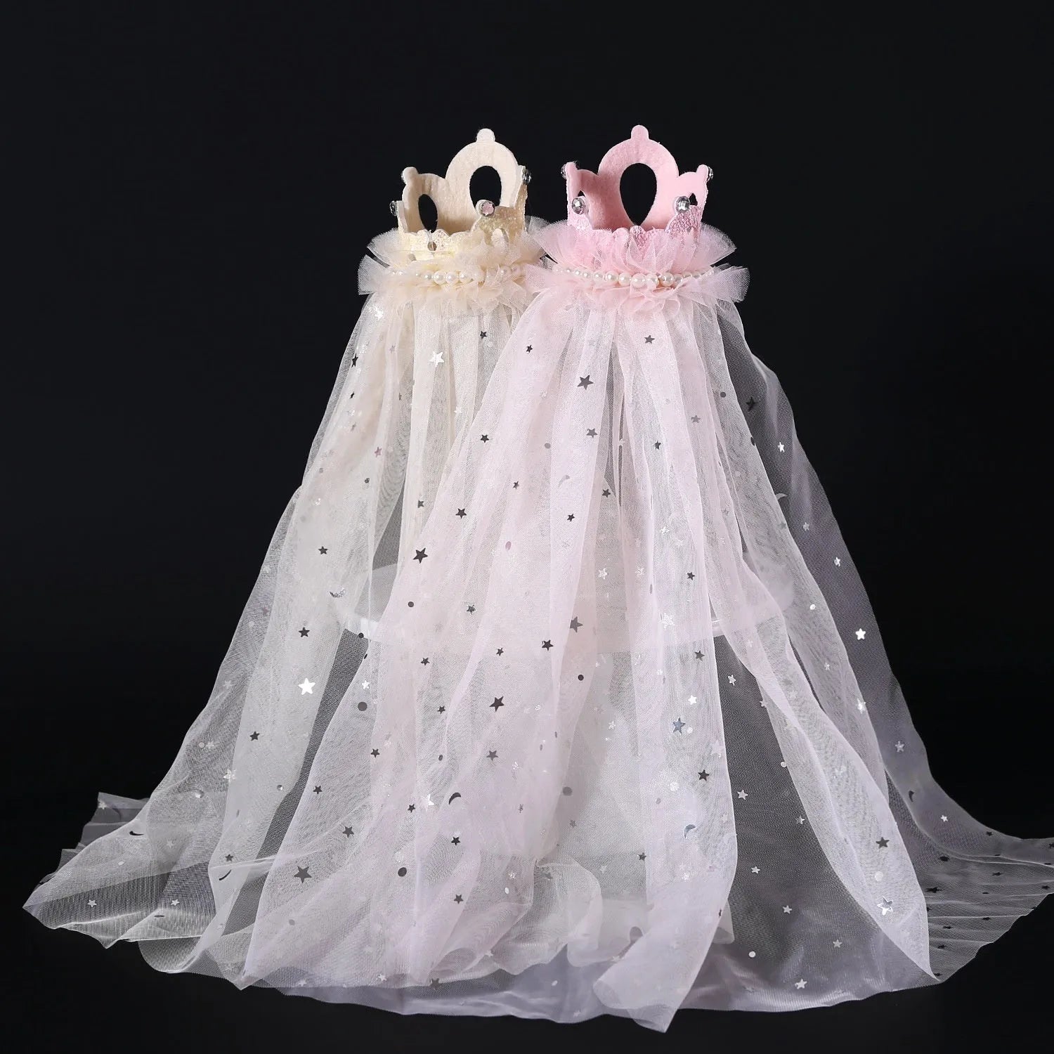 Cat wearing a princess crown headdress with a beige veil, pet wedding accessory