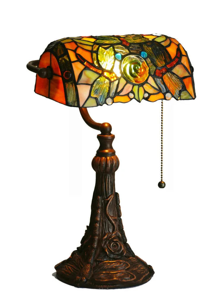 10-inch Tiffany table lamp with coloured stained glass resin shade on a desk.