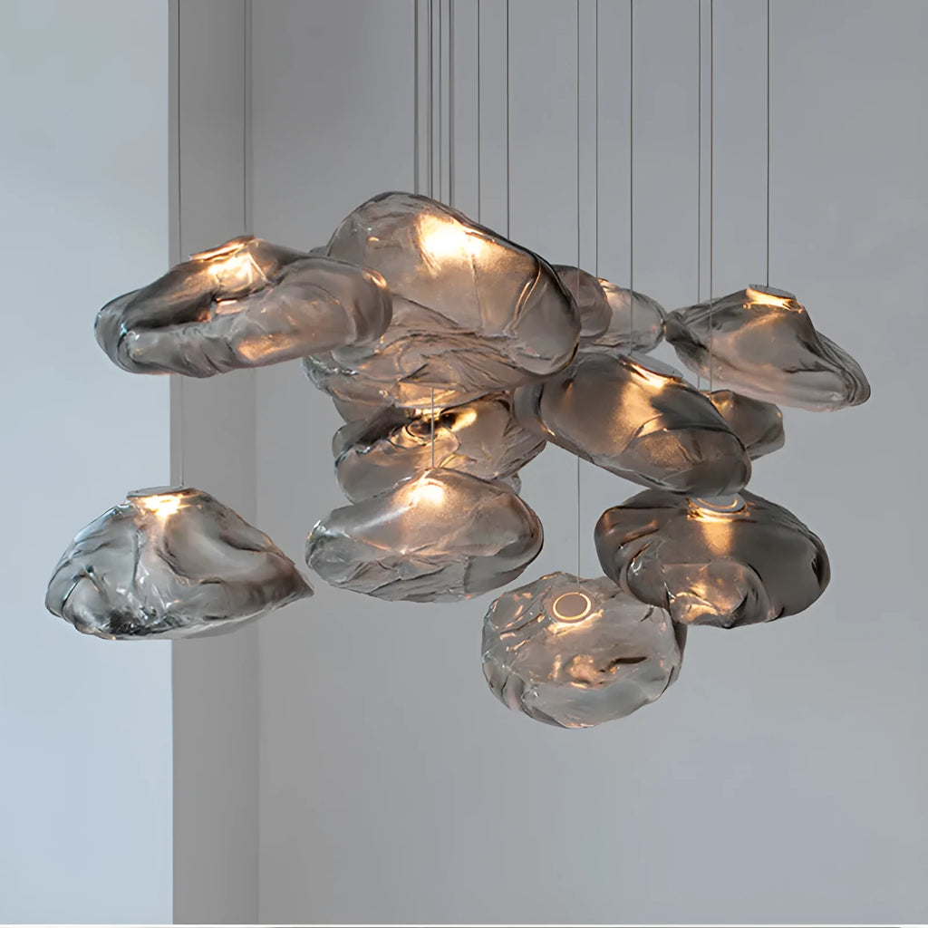Modern fabric-style glass LED chandelier with clear, amber, or smoke grey shade, shown in small and large sizes.