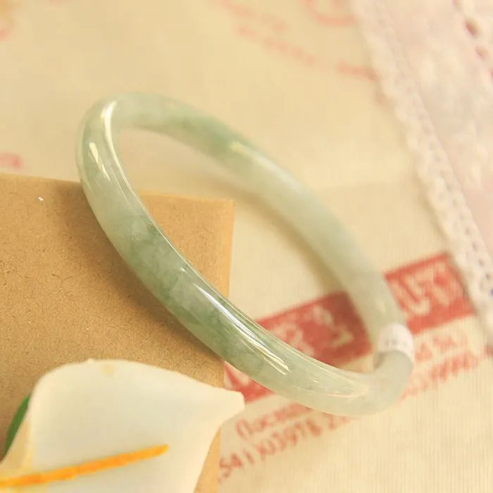Green jade geometric bracelet with 10mm beads showing traditional Chinese style jewellery